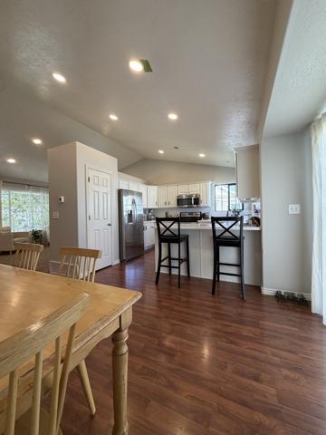 Same kitchen after recessed can lighting was installed